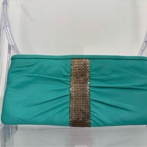 Chic Turquoise Clutch with Gold Accent